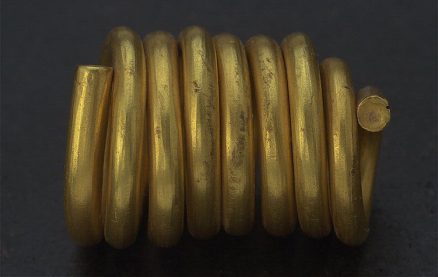 Spiral i guld från folkvandringstiden.